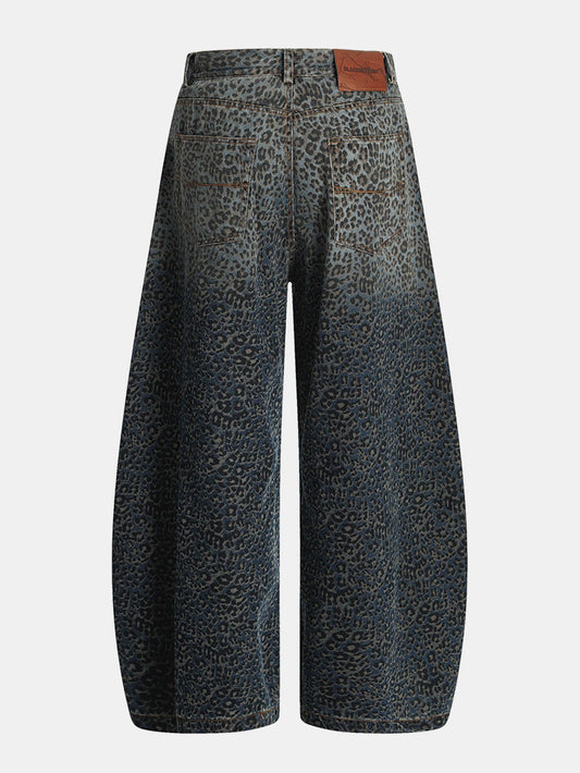 Calça Baggy de Denim com Estampa de Onça e Efeito Desgastado