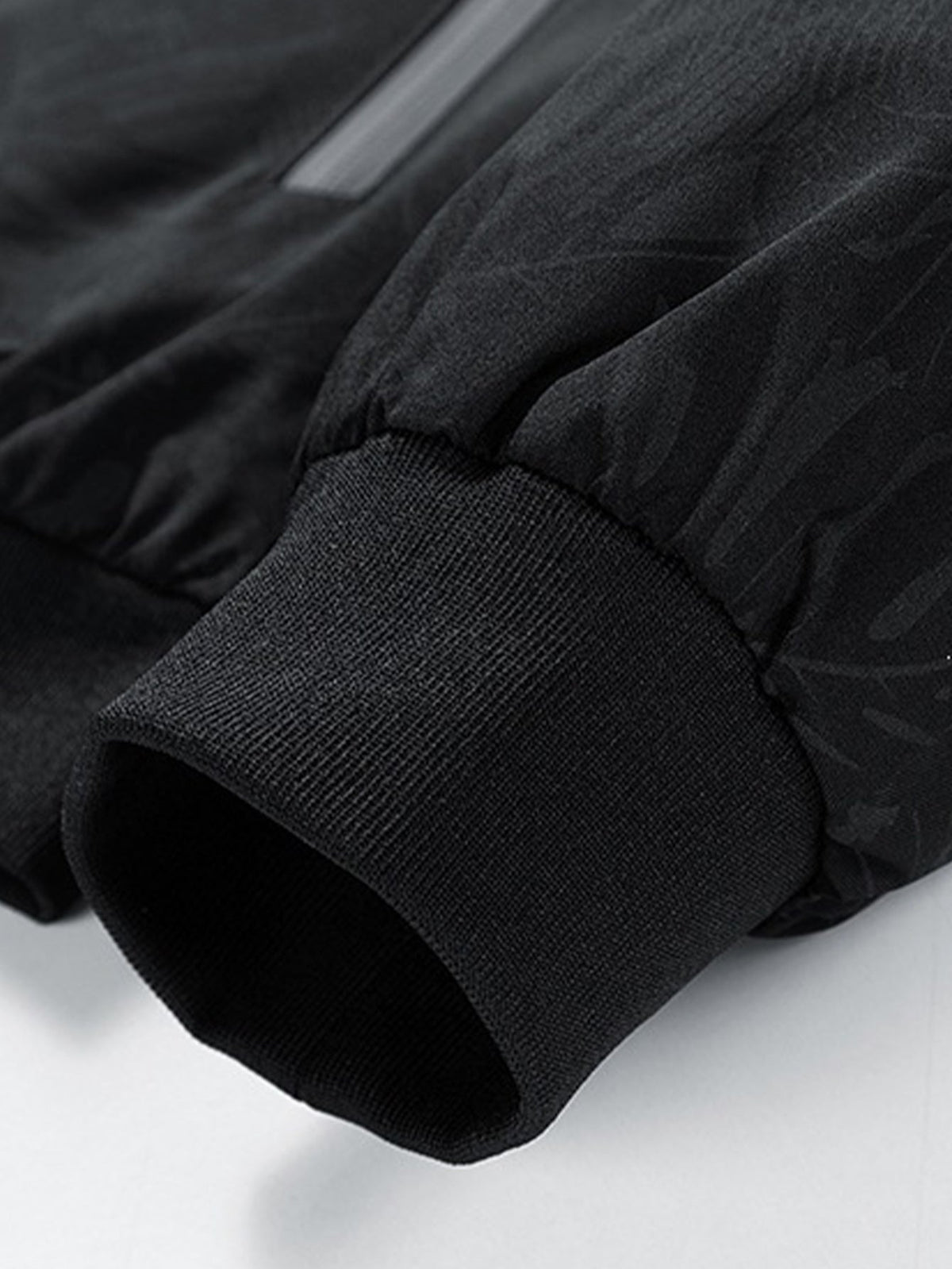 Jaqueta bomber com zíper e estampa de folhas