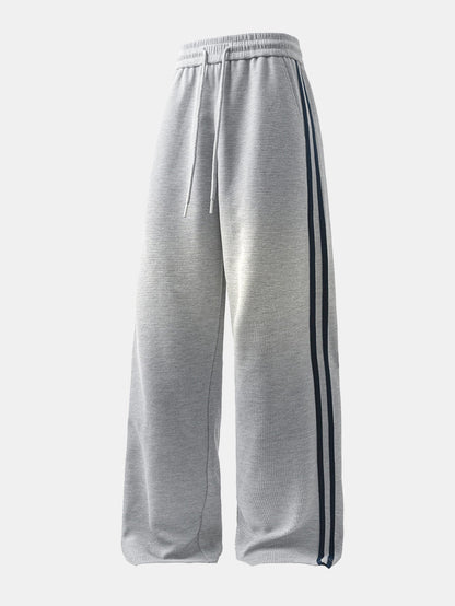 Calça de perna reta com listras contrastantes e textura waffle
