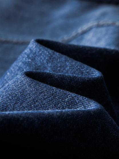 Jaqueta jeans lavada com efeito desgastado